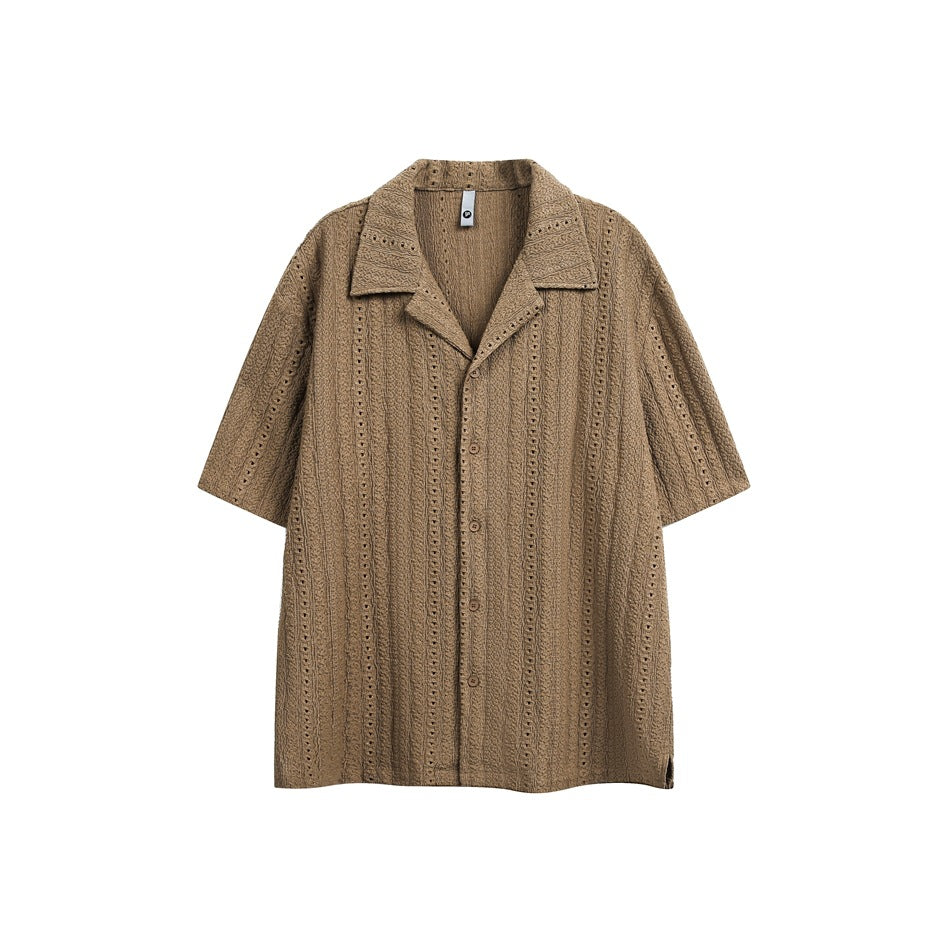 Brown short-sleeve camp-collar shirt with button front and vertical eyelet stripe texture, flat lay