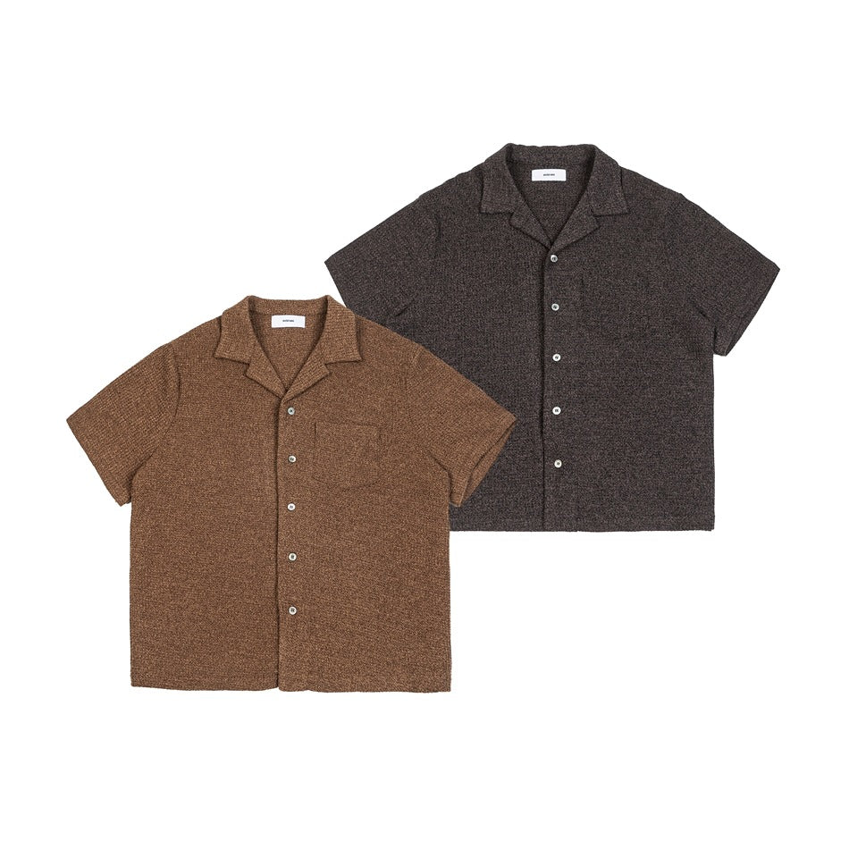 Two short-sleeve brown and charcoal knit shirts with notched collars, buttons, and chest pockets, shown from the front.