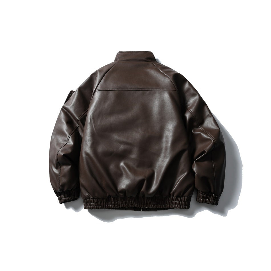 Back view of a dark brown jacket with a horizontal shoulder seam and gathered hem and cuffs.