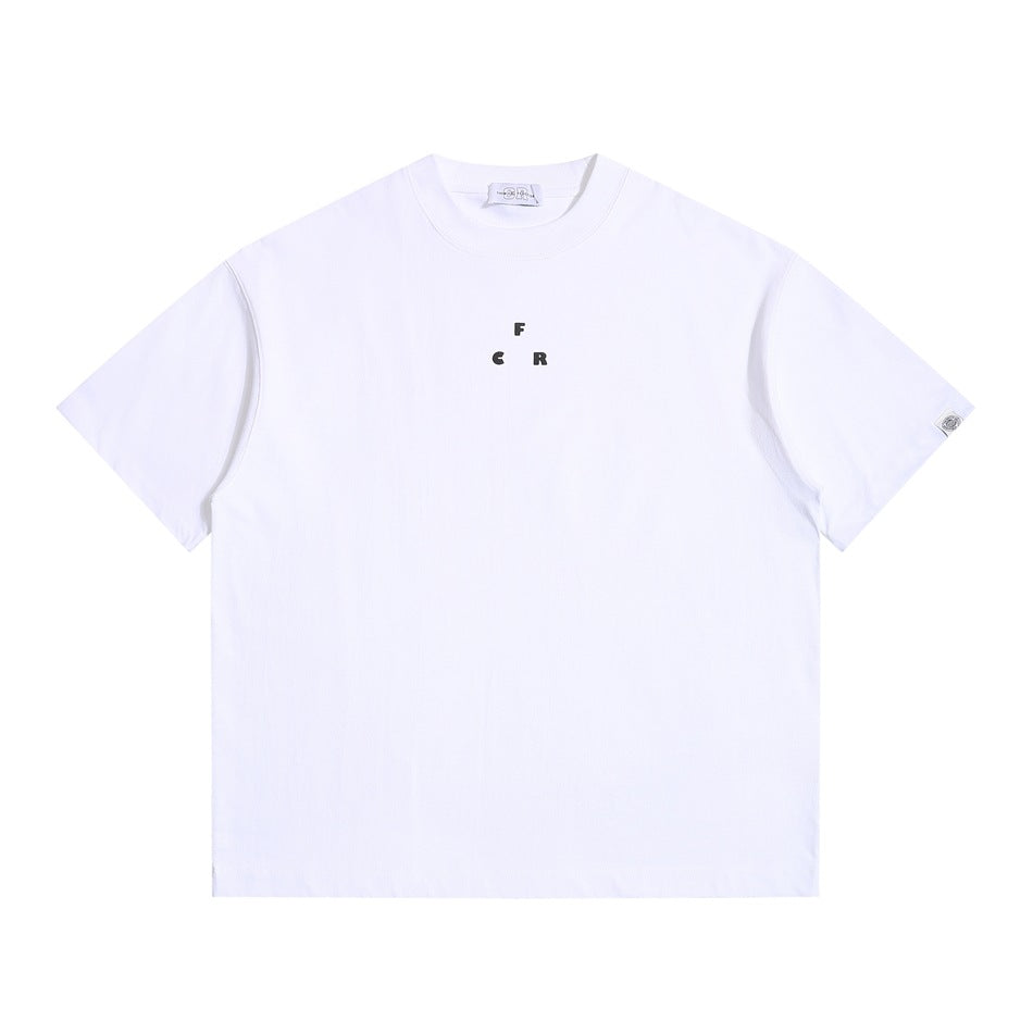 White short-sleeve crew-neck t-shirt, flat front view, small black F C R letter print at center chest