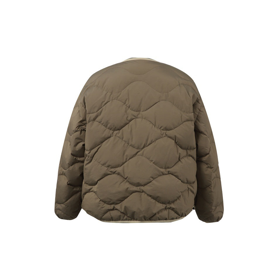 Back view of a taupe quilted jacket with long sleeves and broad wavy quilted stitching.