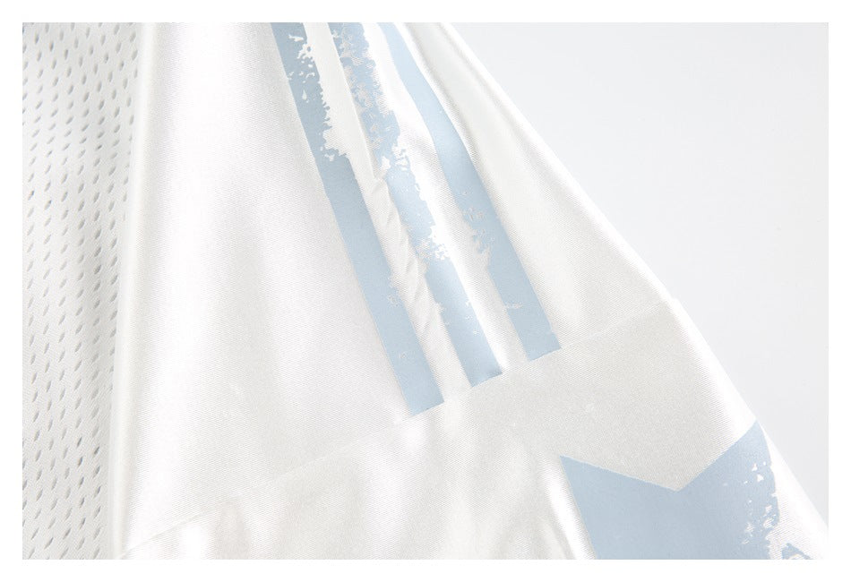 Close-up of a white mesh garment with distressed pale blue vertical graphic stripes.