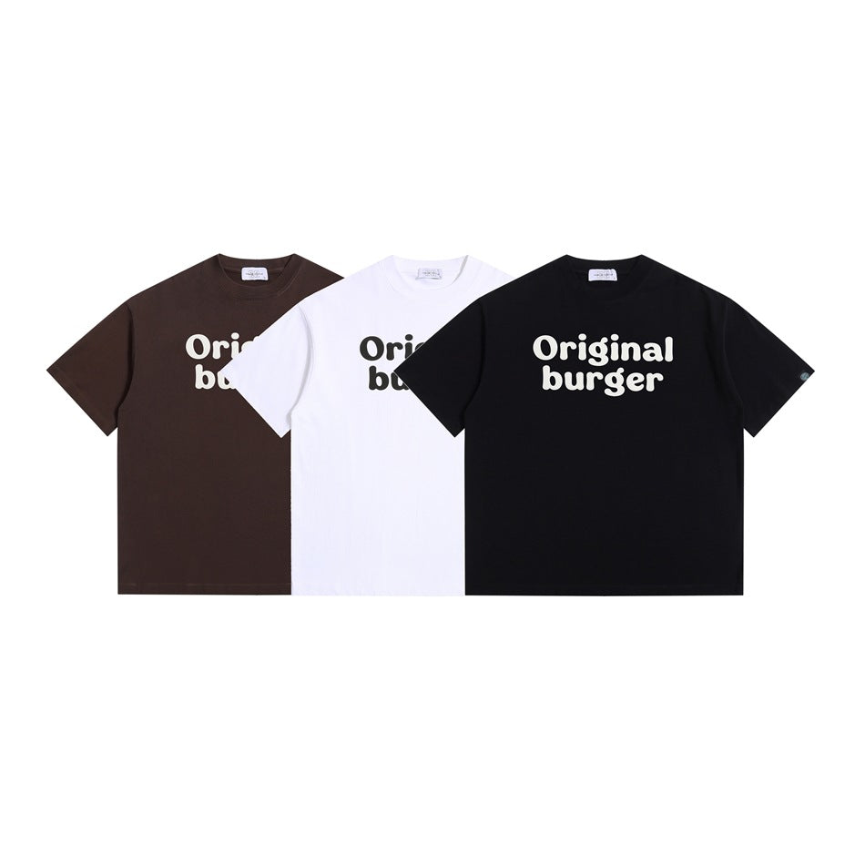 Front view of brown, white, and black short-sleeve T-shirts with “Original burger” lettering on the chest.