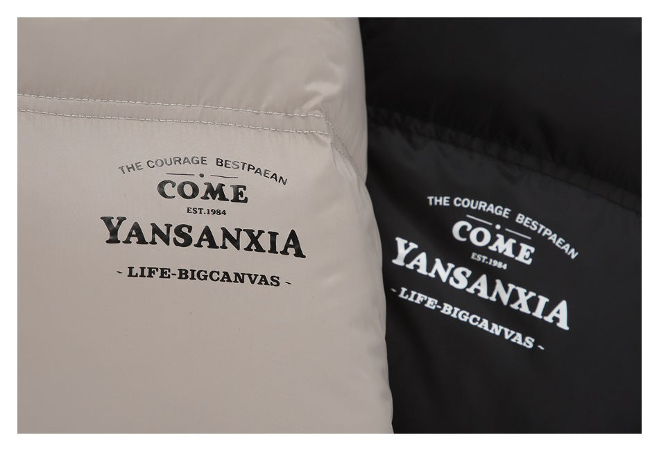 English lettering printed on taupe and black garment panels.