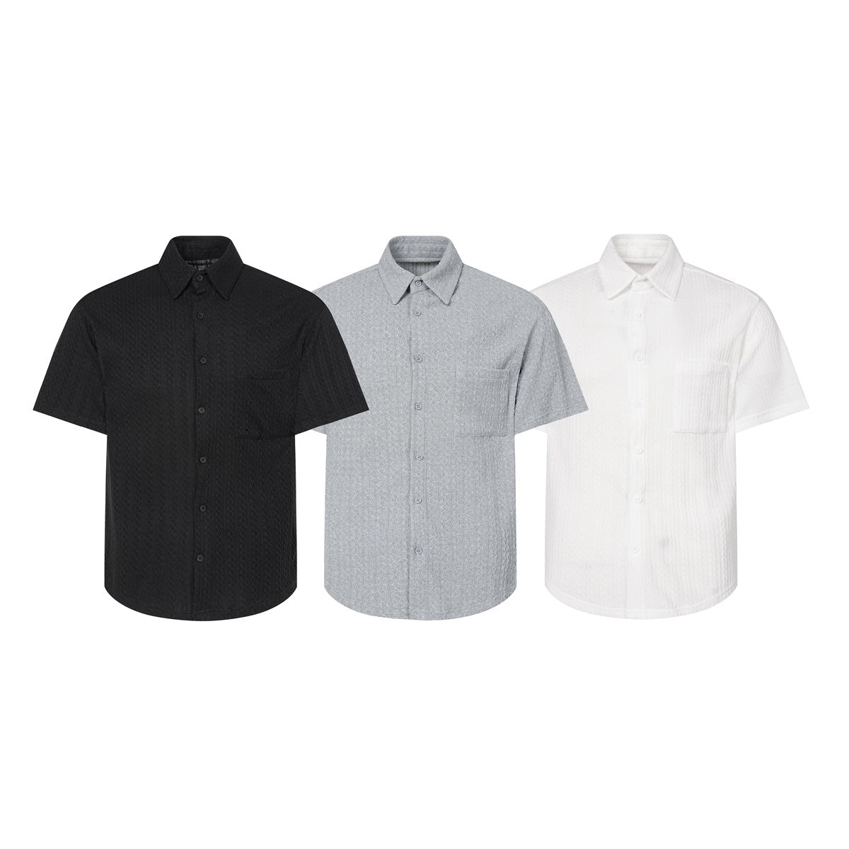 Three short-sleeve button-up shirts with pointed collars and chest pockets in black, gray, and white.