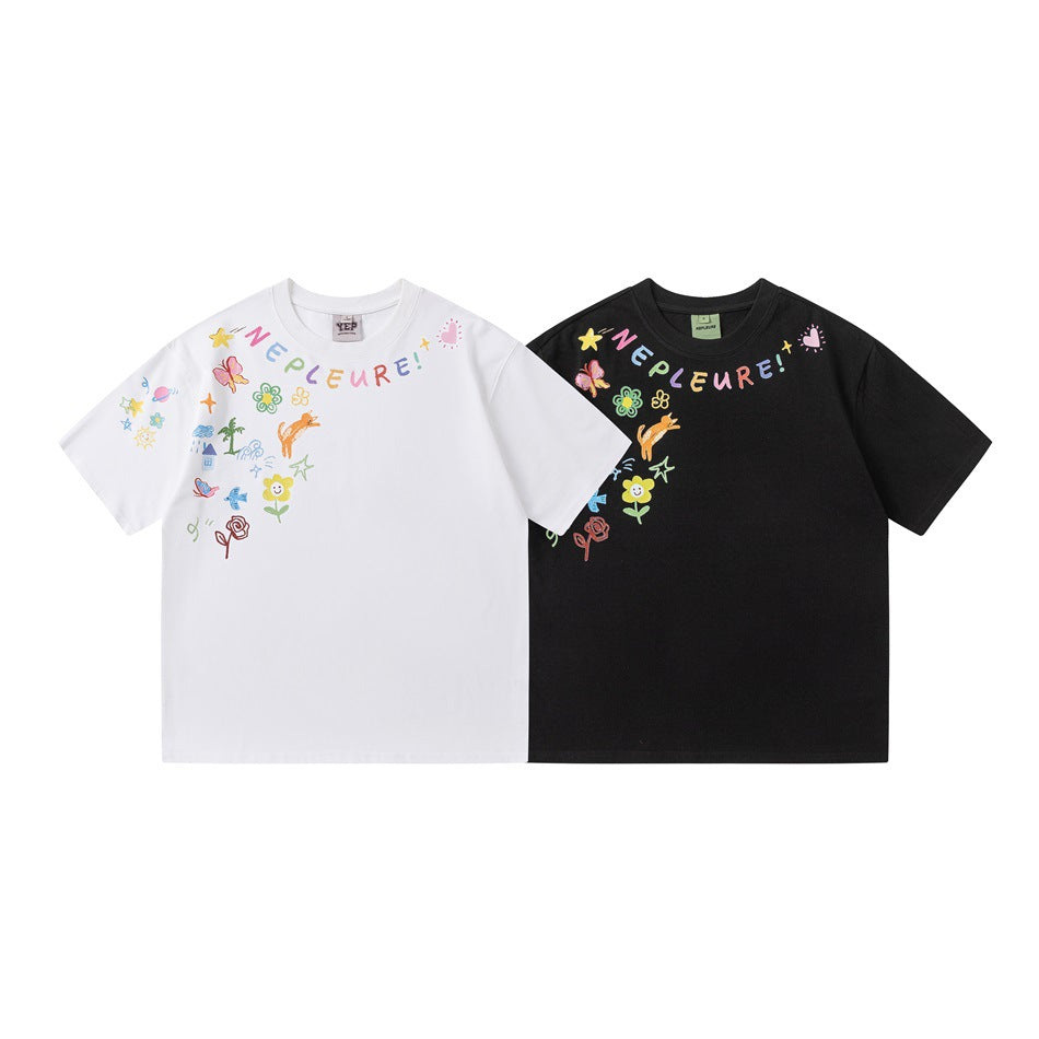 White and black short-sleeve crew-neck T-shirts with matching colorful doodle graphics across the upper front.