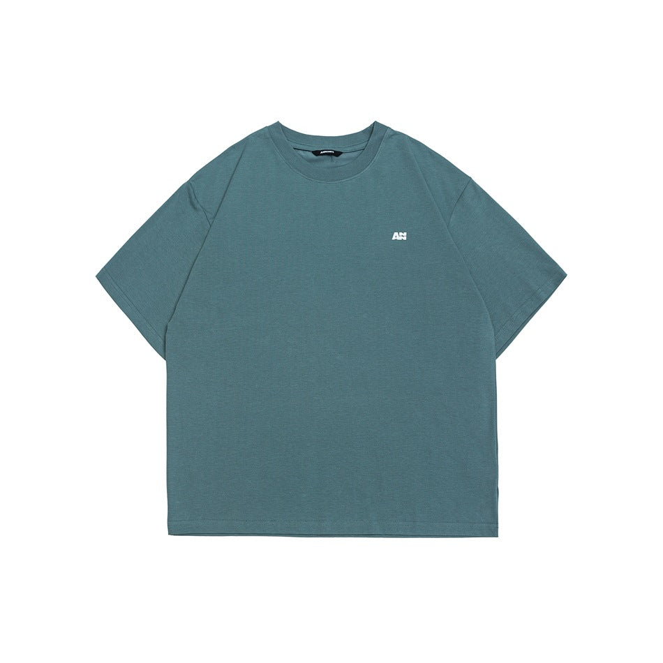 Green short-sleeve crew-neck T-shirt with small white chest logo, flat front view