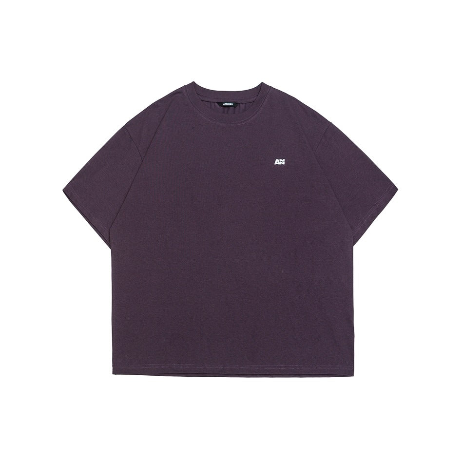 Purple short-sleeve crew-neck T-shirt with small white chest logo, flat front view