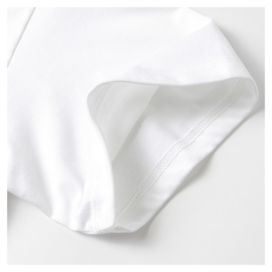 Close-up of a white shirt sleeve opening, showing the folded edge and inner overlock stitching.