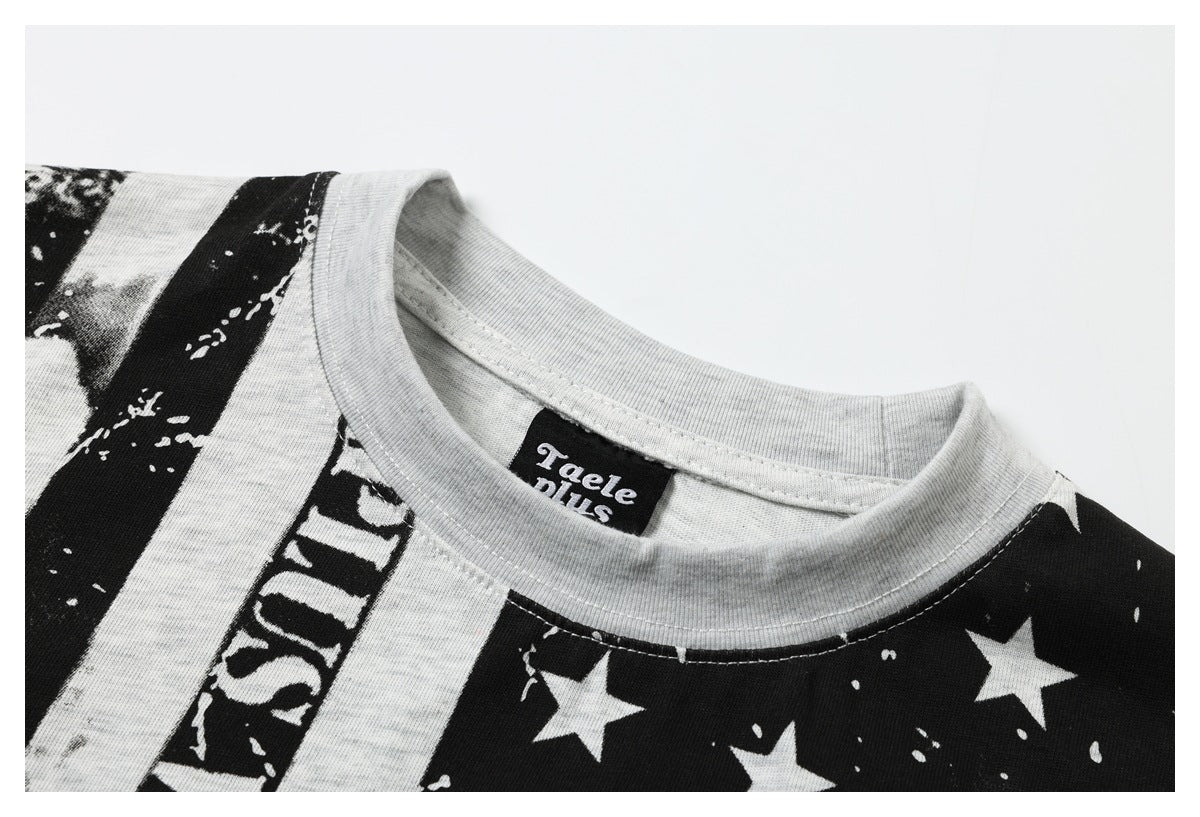 Close-up of a light heather gray T-shirt neckline and collar beside a black-and-white star print.