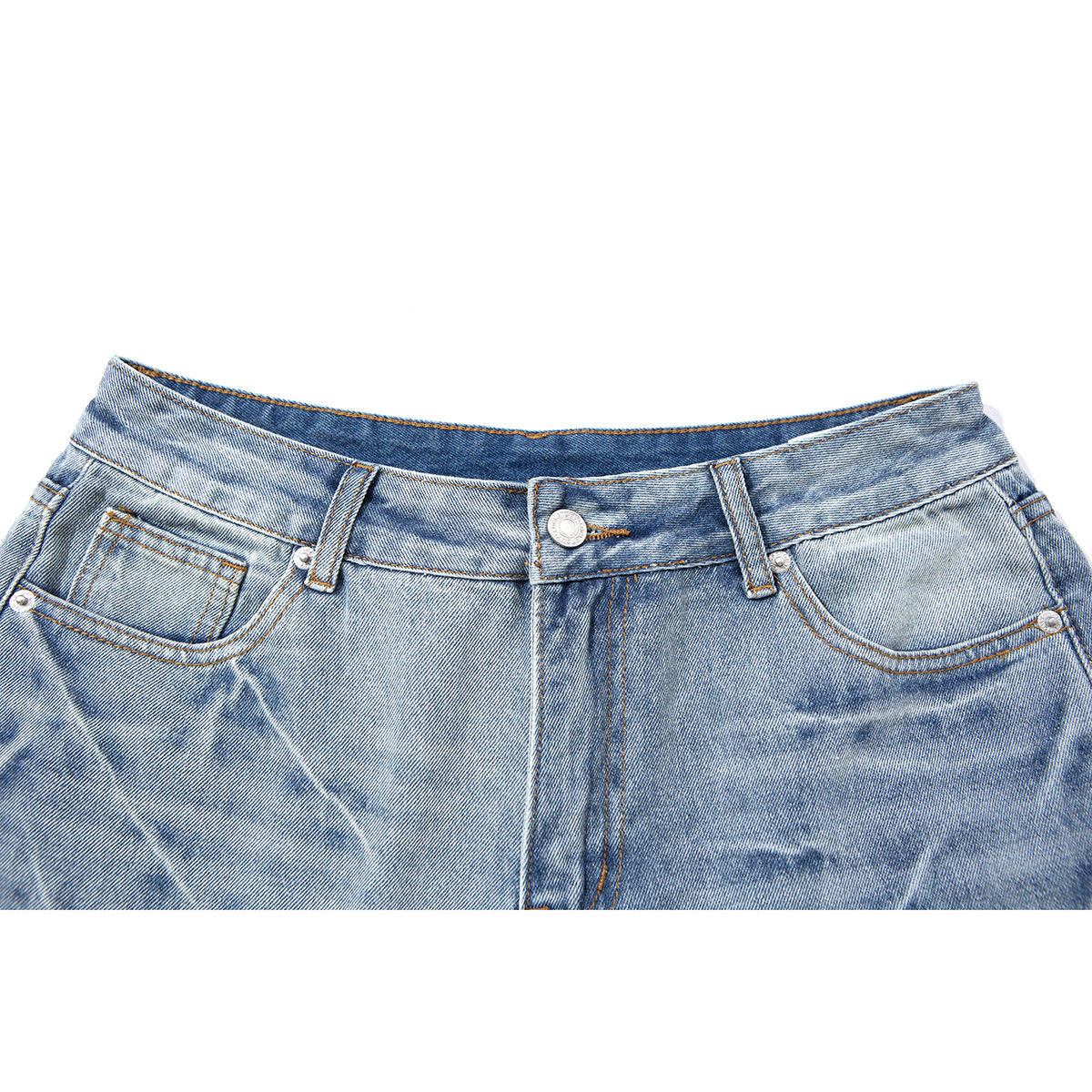 Close-up of light blue washed denim shorts showing the front waistband, button, fly, and pockets.