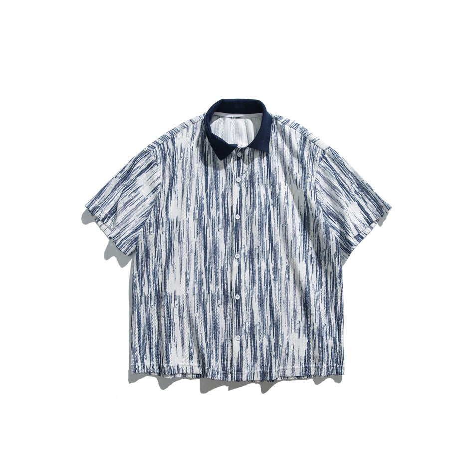 Navy and white streaked short-sleeve button-up shirt with navy collar, flat lay front view