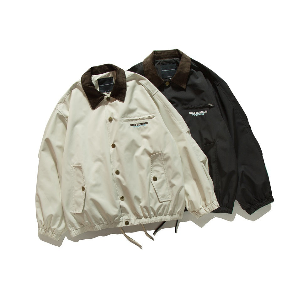 Ivory and black jackets shown from the front, each with a dark brown collar, snap buttons, pockets, and gathered hems.