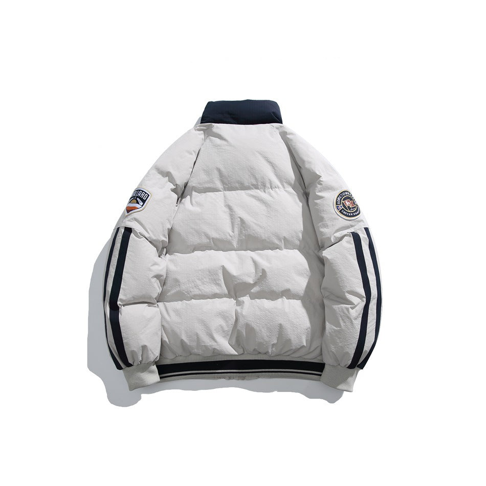 Back view of a white puffer jacket with a navy collar, sleeve patches, navy sleeve stripes and striped hem.