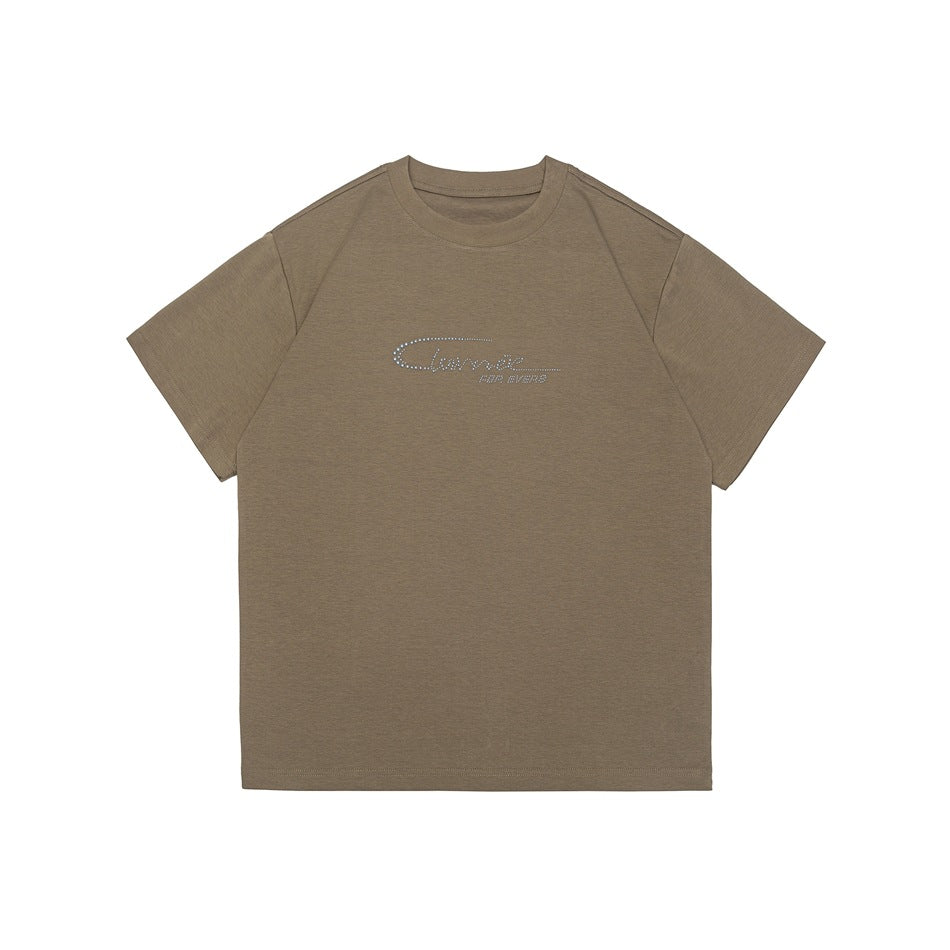 Khaki short-sleeve crew-neck T-shirt with a small silver dotted script graphic on the chest, flat lay front view