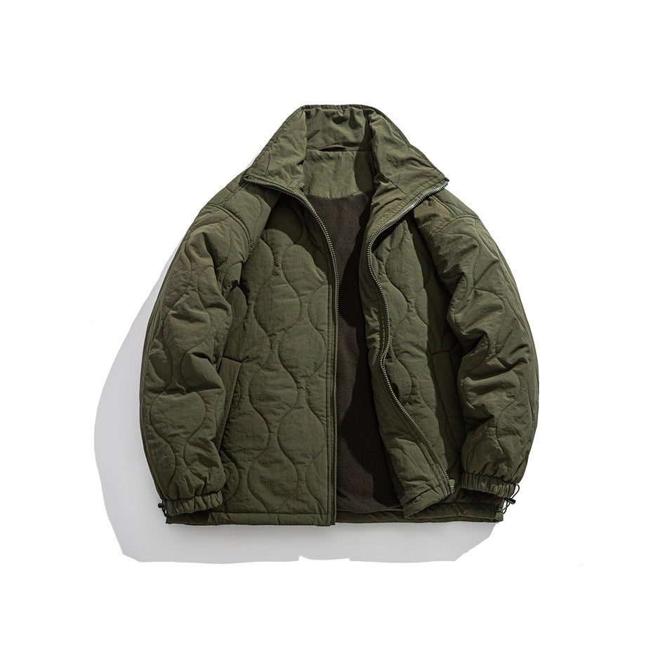 Army green quilted stand-collar zip jacket laid flat, open to show dark fleece-like inner layer