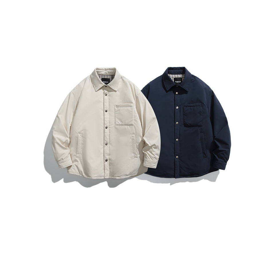 Ivory and navy shirt jackets shown from the front, with snap closures and chest and lower pockets.