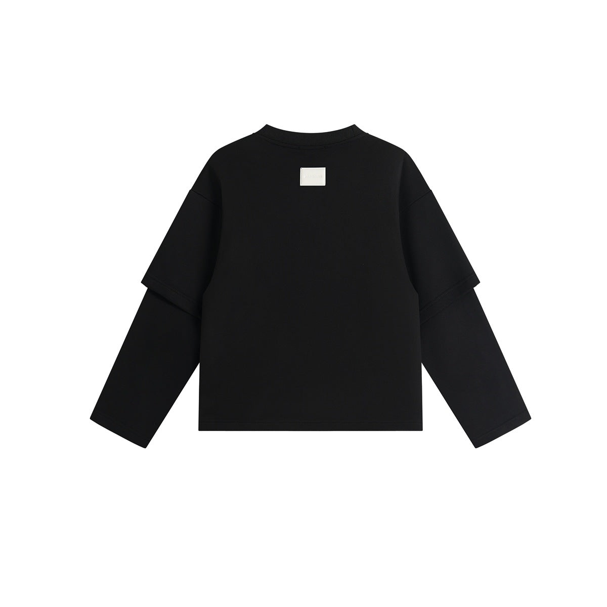 Back view of a black crewneck shirt with layered long sleeves and a small rectangular patch near the neckline.
