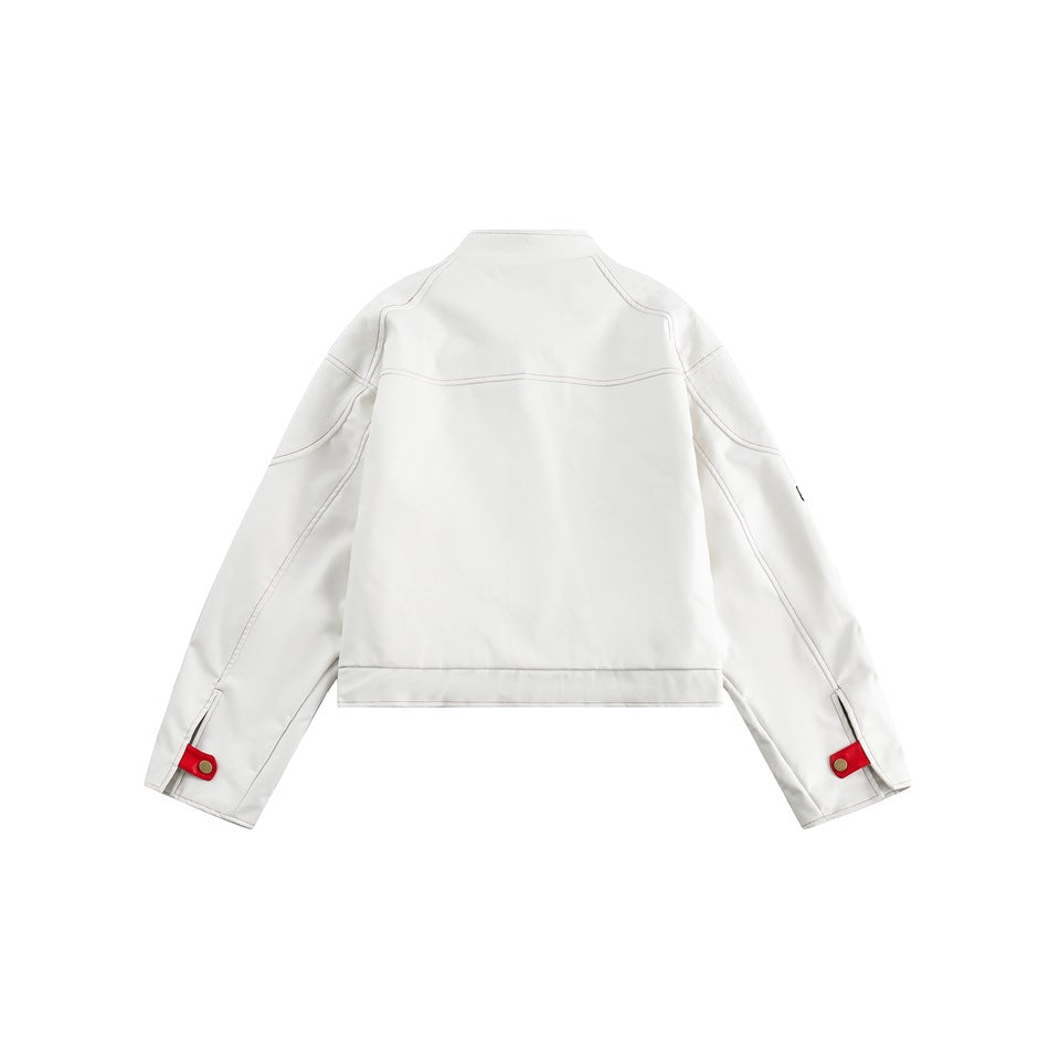 Back view of an off-white jacket with curved panel seams and red snap tabs at the cuffs.