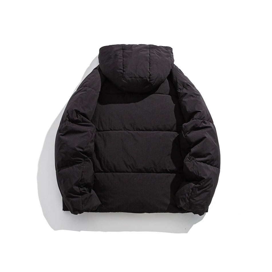Back view of a black hooded puffer jacket laid flat against a white background.