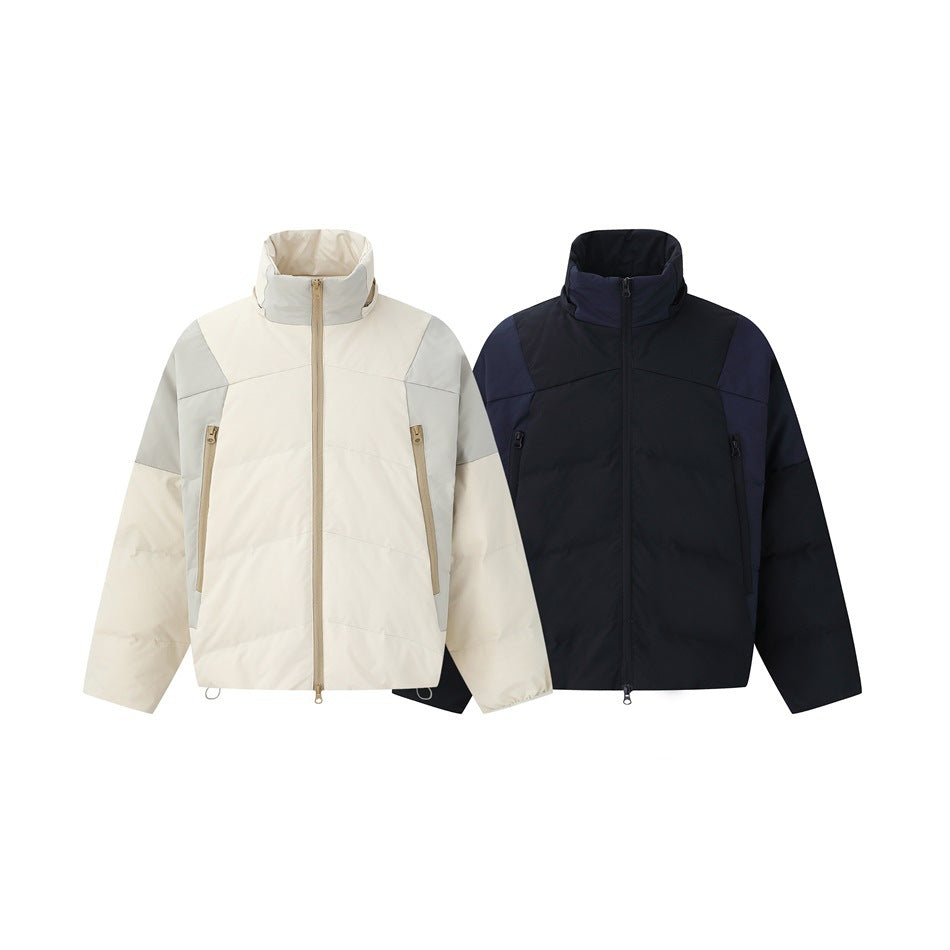 Cream and black puffer jackets with stand collars and front zippers shown side by side without hoods