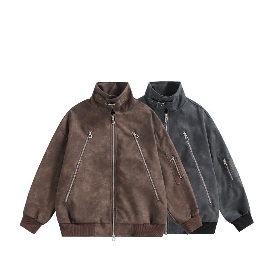 Two front-facing jackets in brown and charcoal, with stand collars, zip pockets and ribbed cuffs and hems.
