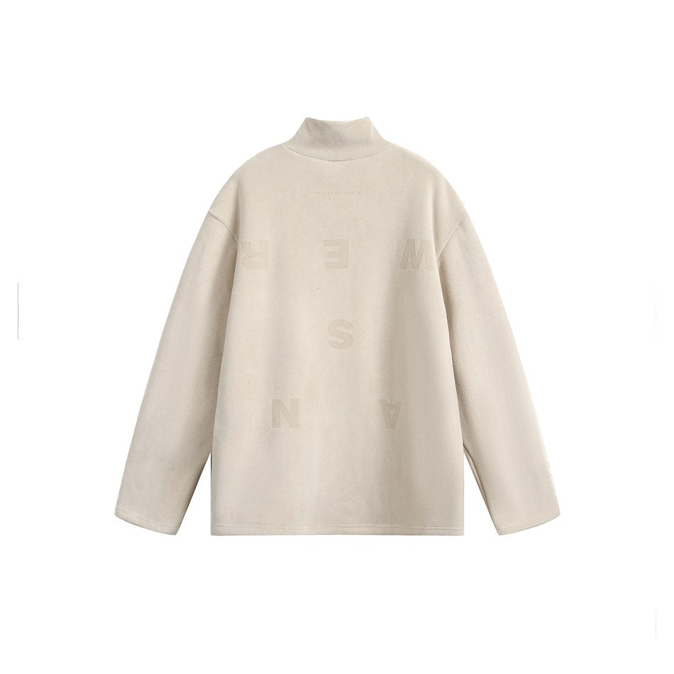 Cream high-neck long-sleeve top shown from the back, with subtle oversized lettering.