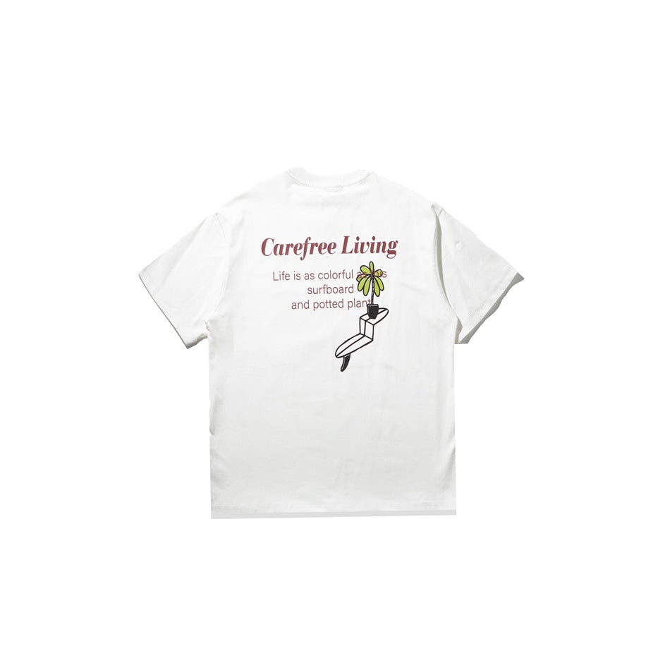 White short-sleeve T-shirt back view with Carefree Living text and potted plant on surfboard graphic