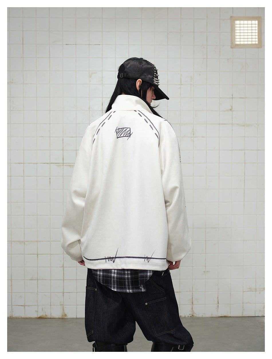Person wearing a cream zip-up jacket, shown from behind with dark sketch-style graphics and a high collar.