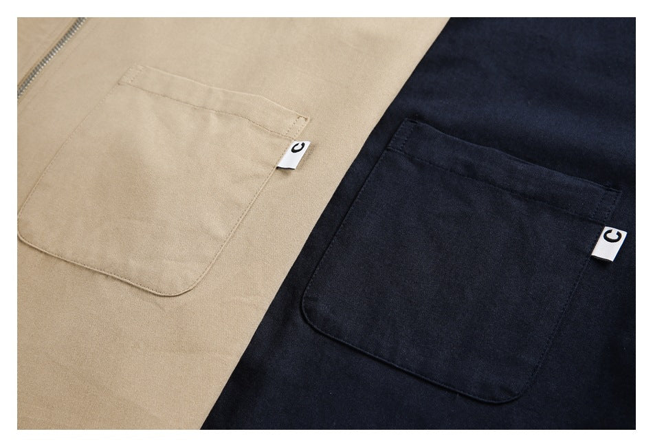 Close-up of tan and dark navy jacket fronts with large patch pockets and small white fabric tabs.