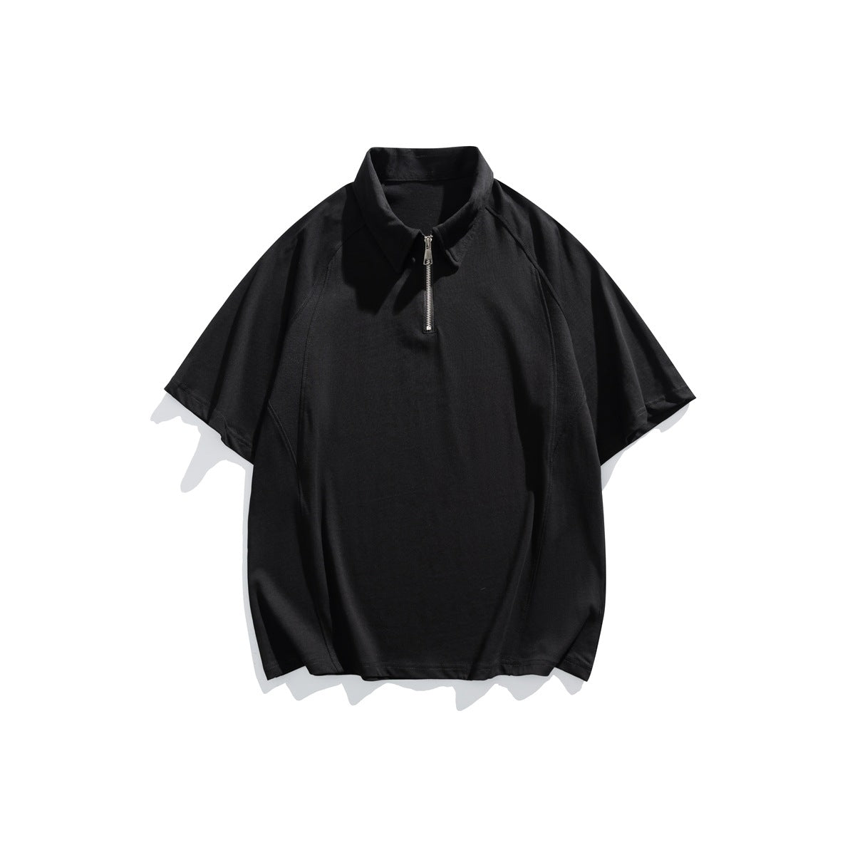 Black short-sleeve polo-style top with half-zip collar and raglan sleeves, flat lay front view