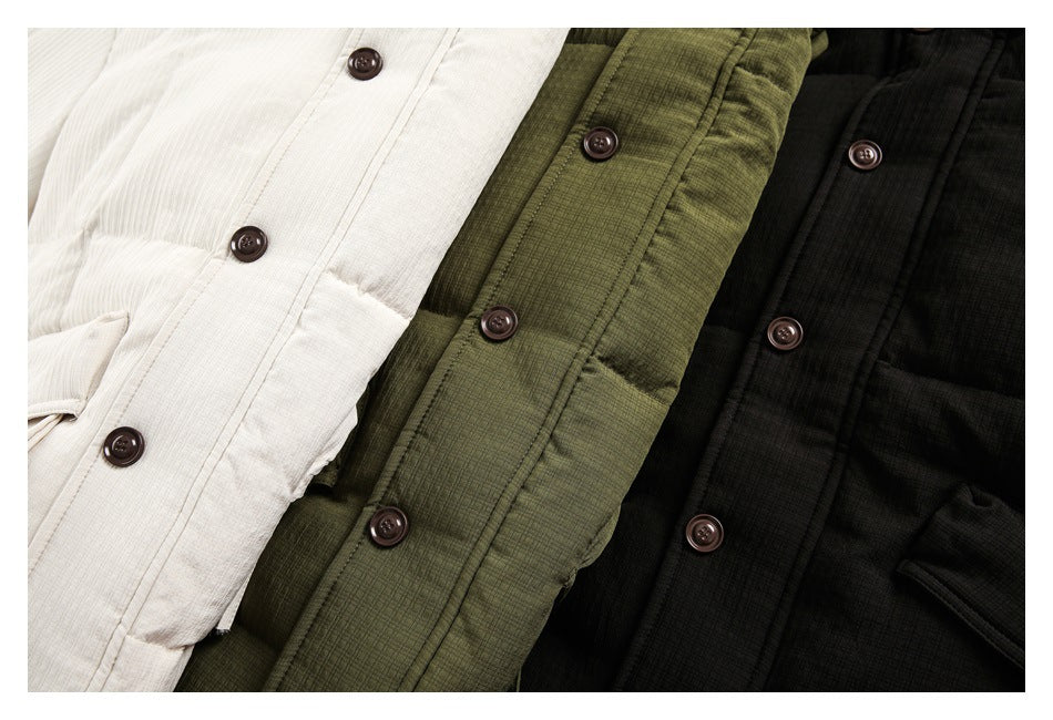 Three textured button-front jackets laid side by side in ivory, olive green, and black.