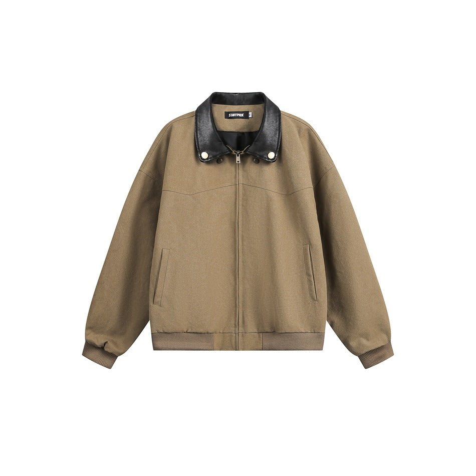 Brown zip-front bomber jacket with black glossy fold-over collar, gold snap buttons and ribbed cuffs and hem