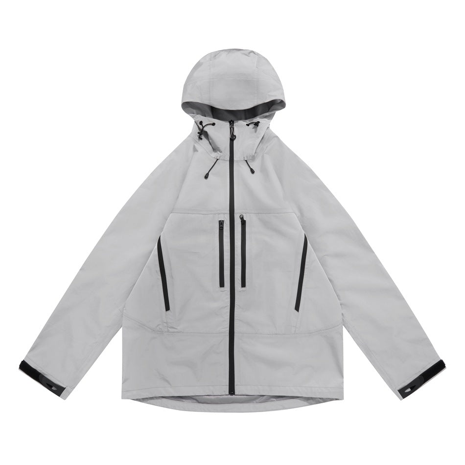 Light gray hooded zip-front jacket flat lay with black zipper and chest zip pockets