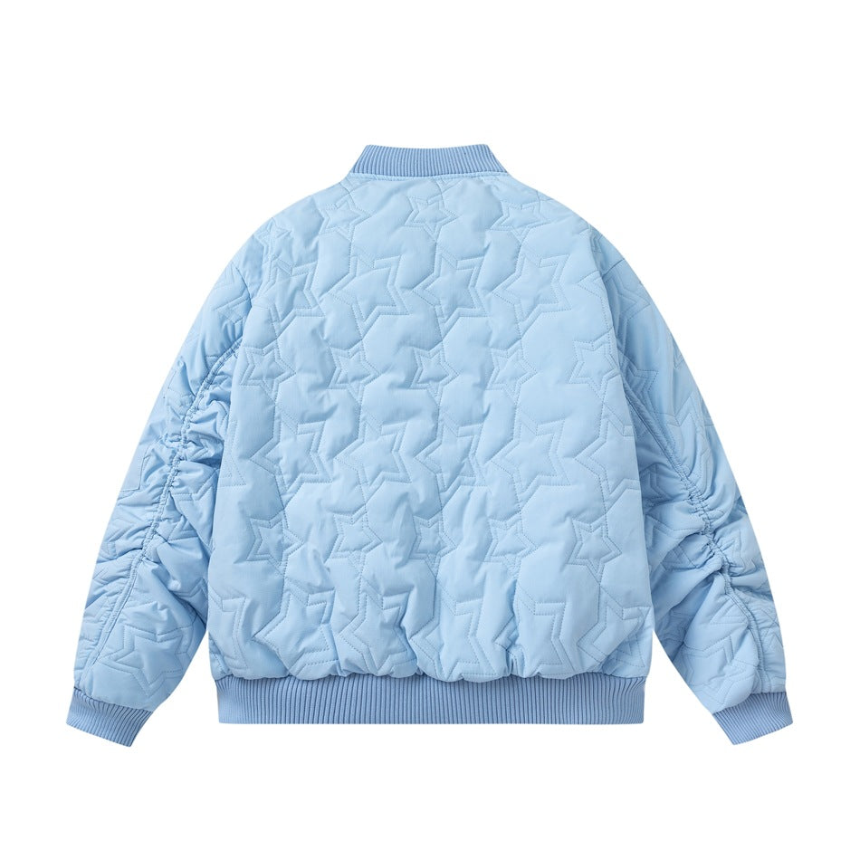 Back view of a light blue bomber jacket with all-over star quilting and ribbed collar, cuffs, and hem.