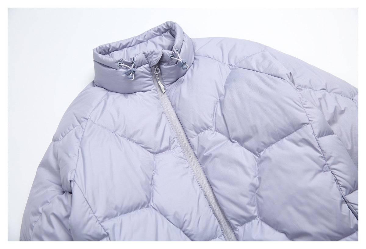 Close-up of a pale lavender quilted jacket showing its high drawcord collar and front zipper.