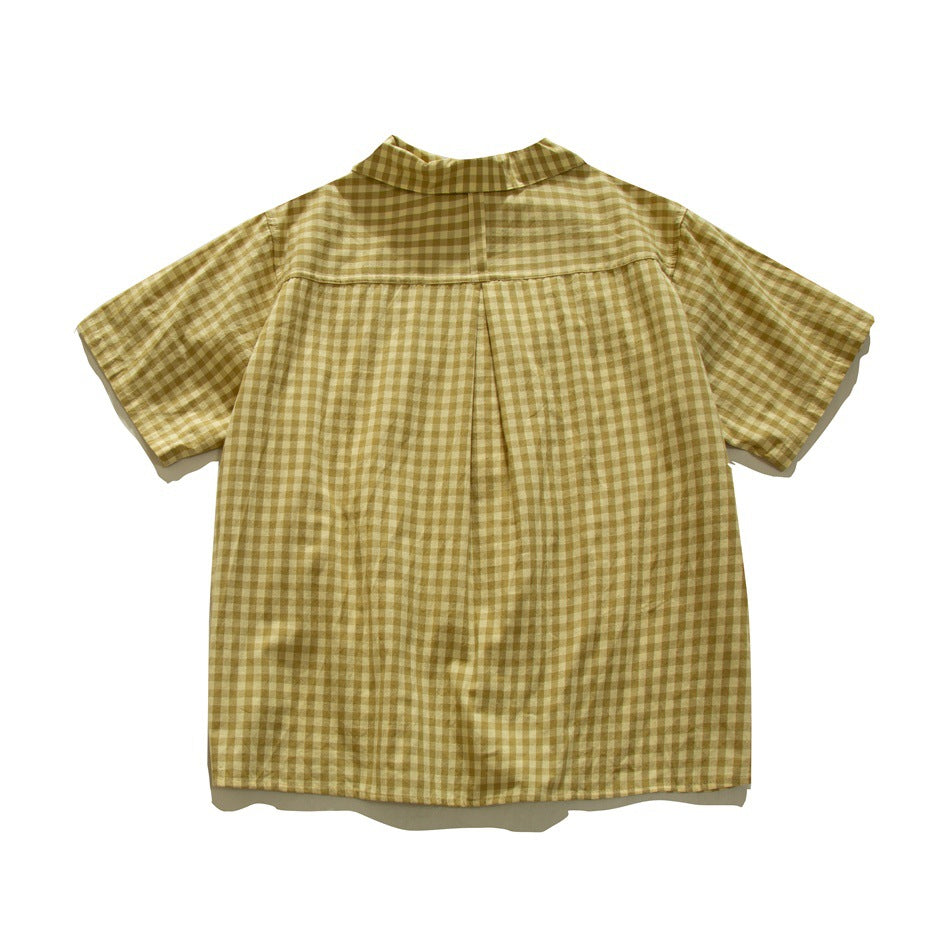 Back view of a mustard-and-cream checked short-sleeve button-up shirt laid flat.