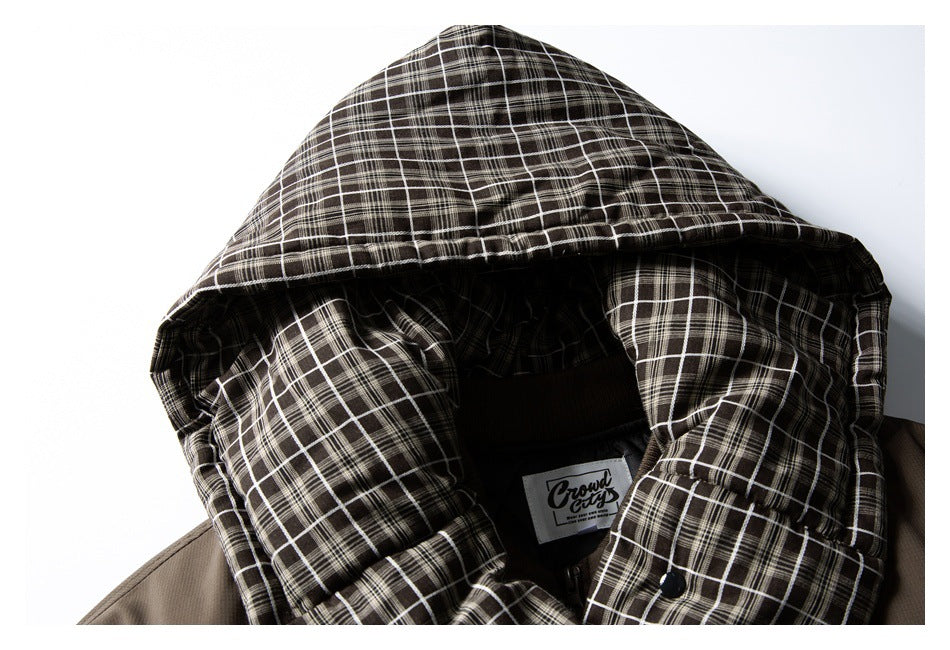 Close-up of the hood's black-and-white plaid lining and sewn-in English brand label.