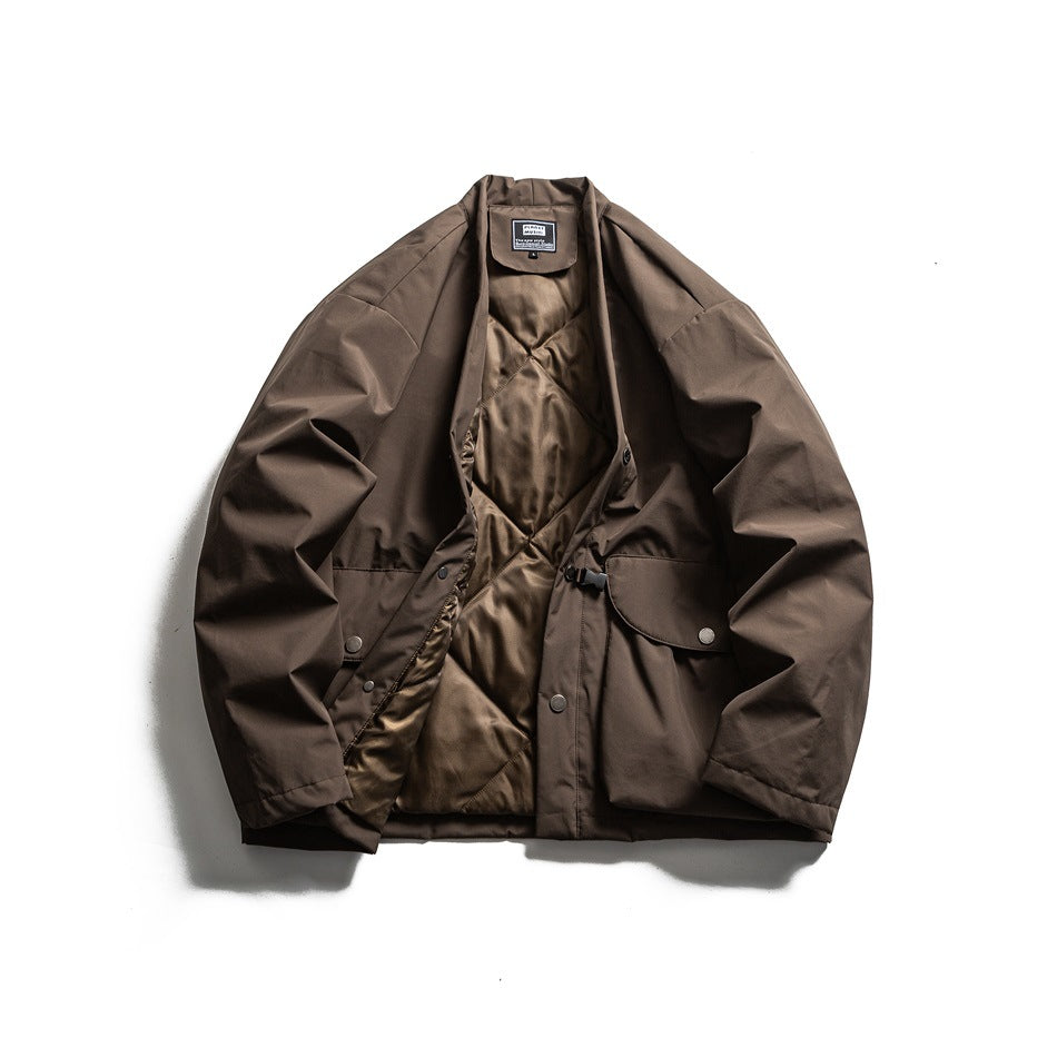 Brown jacket shown open from the front, revealing its shiny lining, snap closures, and flap pockets.