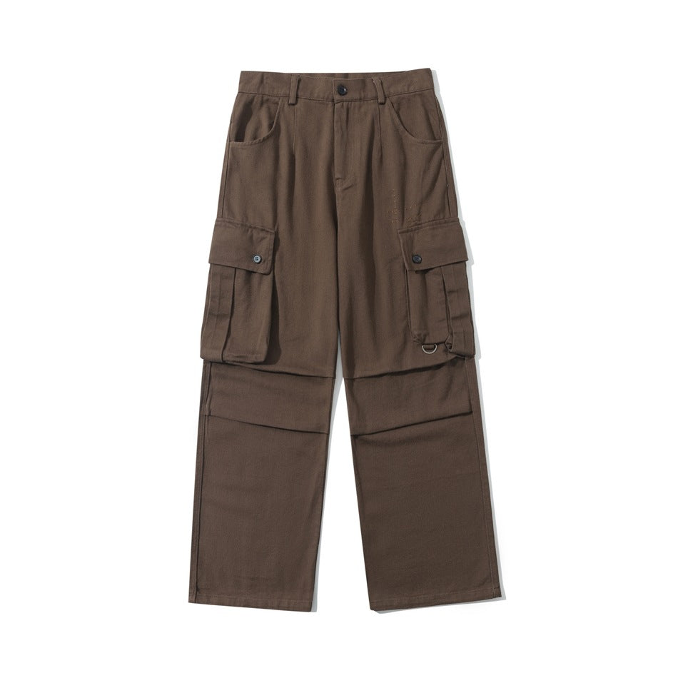 Brown straight-leg cargo pants flat lay front view with large flap cargo pockets and D-ring detail