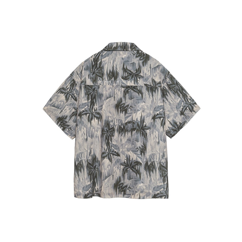 Back of a short-sleeve camp-collar shirt with all-over gray, beige and olive abstract palm print