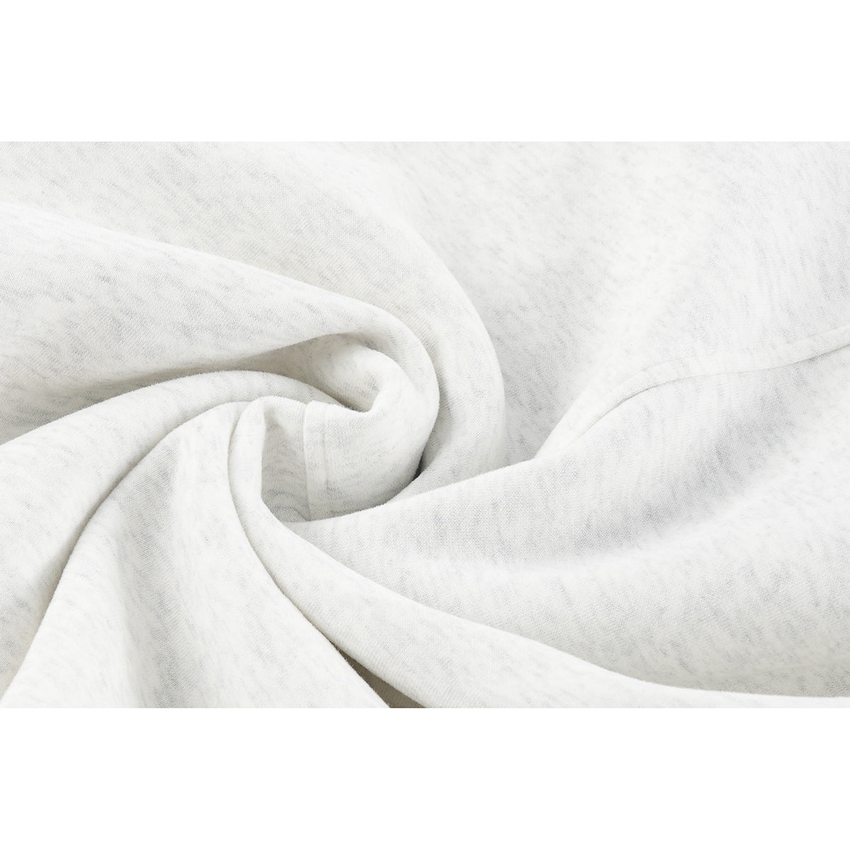 Close-up showing the light gray sweatshirt fabric gathered into soft folds.