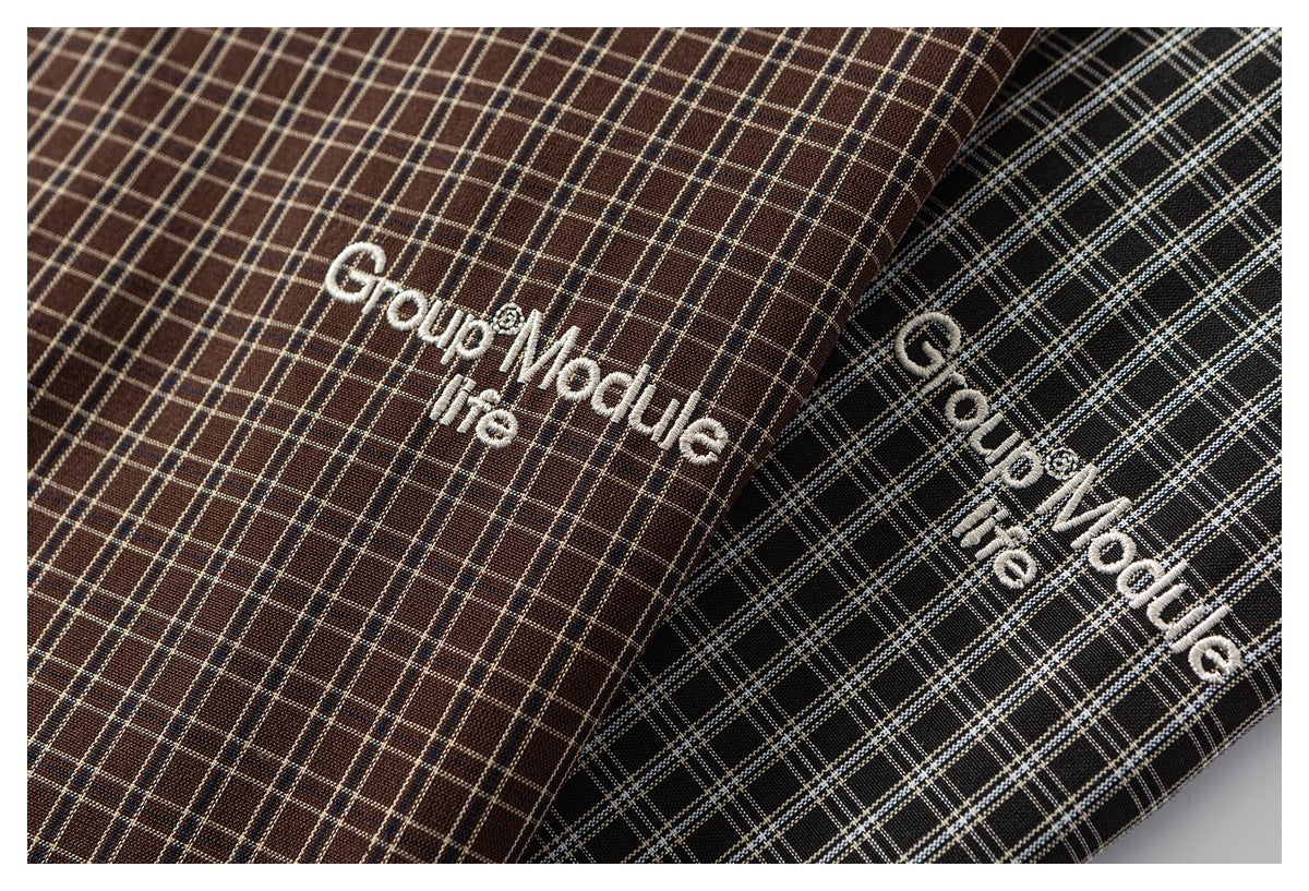 Brown and black plaid fabrics shown together, both with white embroidered lettering.