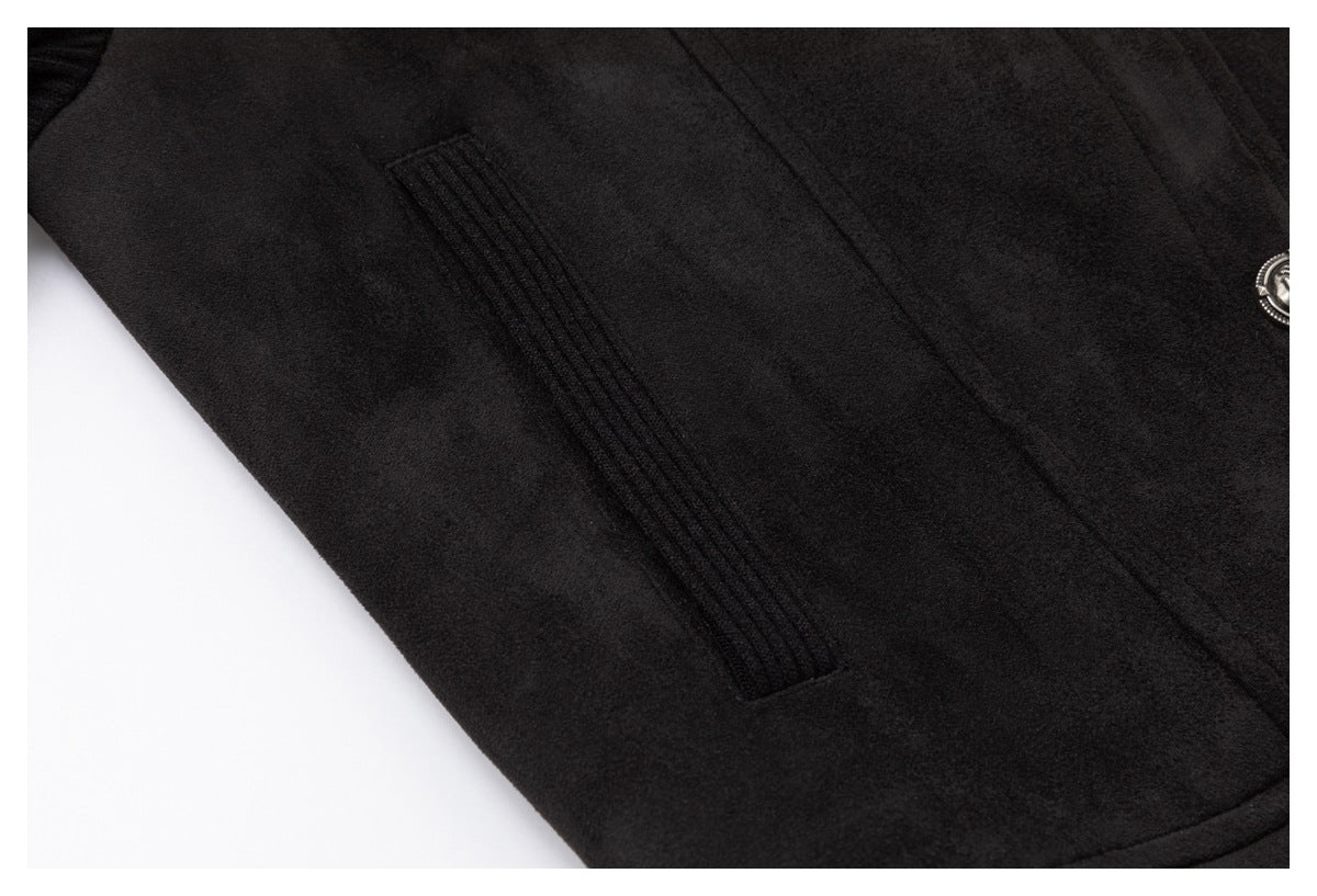 Close-up of a ribbed vertical pocket detail on the black jacket.