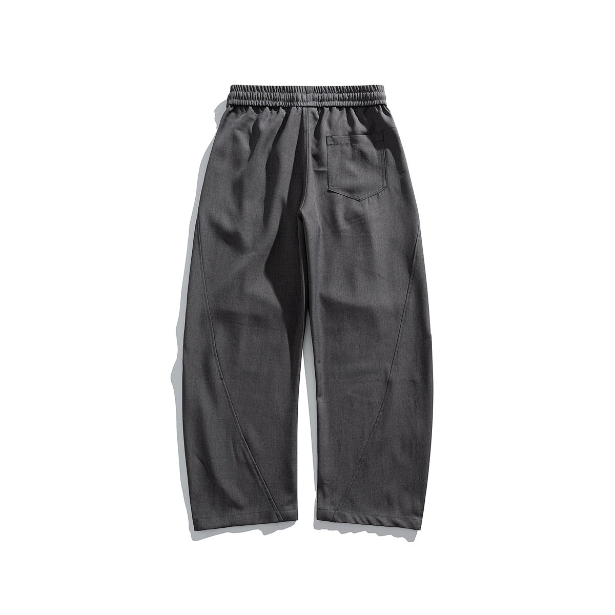 Dark gray wide-leg trousers back view with elastic waistband, back patch pocket and curved leg seams