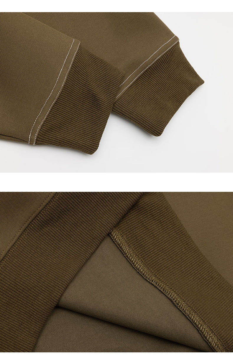 Close-ups of olive-brown sweatshirt ribbed cuffs and interior stitching.