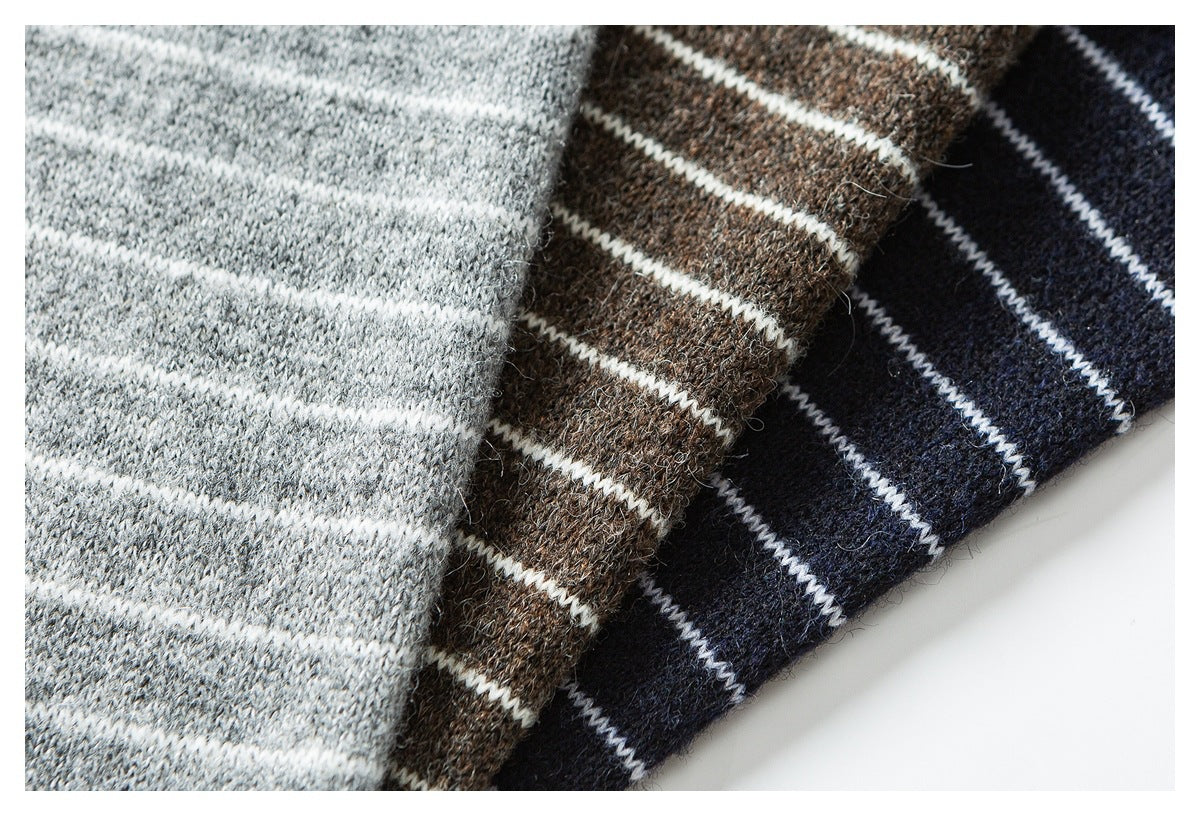 Close-up of striped shirt fabric colorways in gray, brown, and navy, each with narrow white stripes.