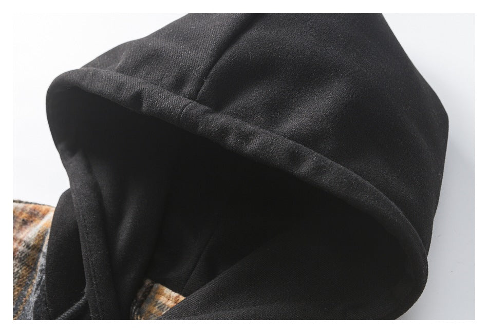 Close-up of the black hood, showing its folded edge and seam stitching.