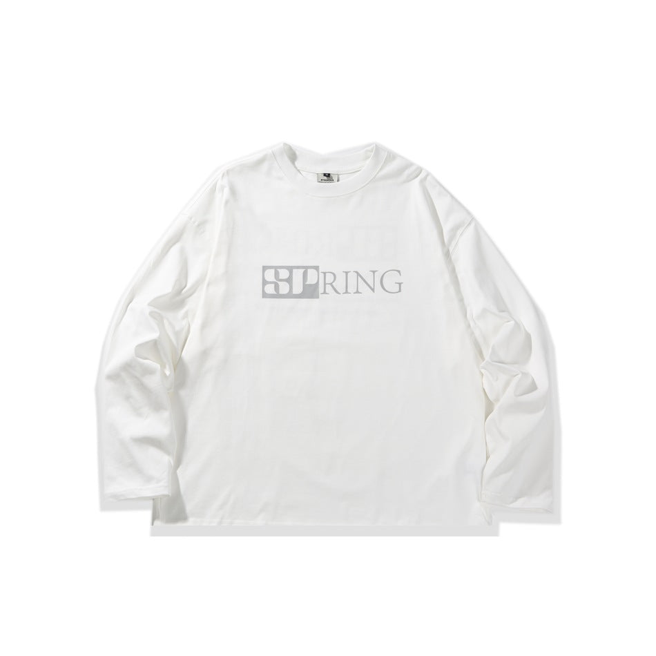 White long-sleeve crew-neck top with drop shoulders and a gray SPRING graphic on the chest, flat lay