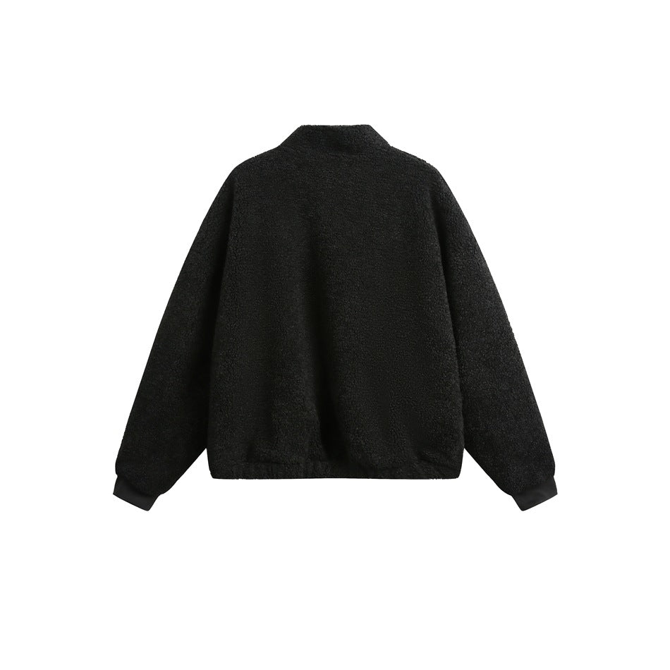 Back view of a black fleece jacket with a stand collar, long sleeves, and matching cuffs and hem, on white.